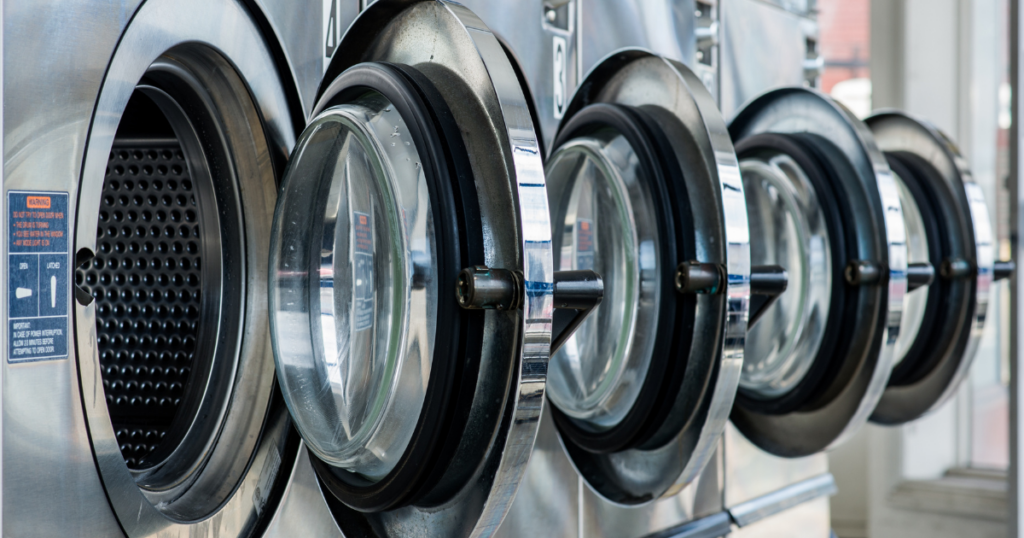 Large, open washing machines showcasing the practical and time-saving benefits at Anthony's laundromat.